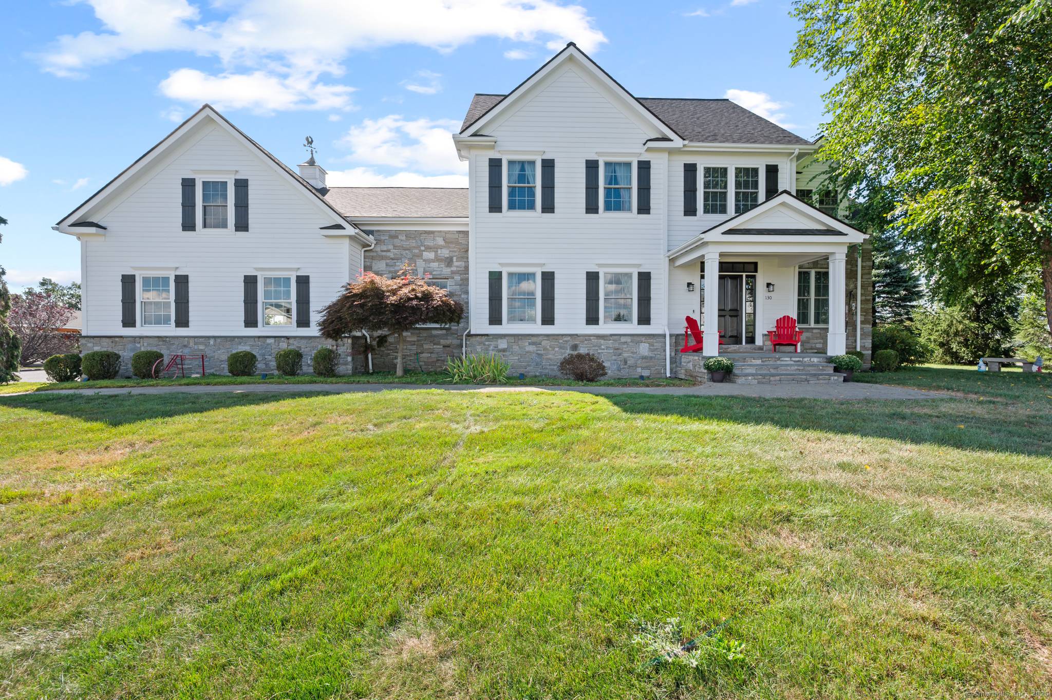 This stunning four bedroom home is situated on 1.
