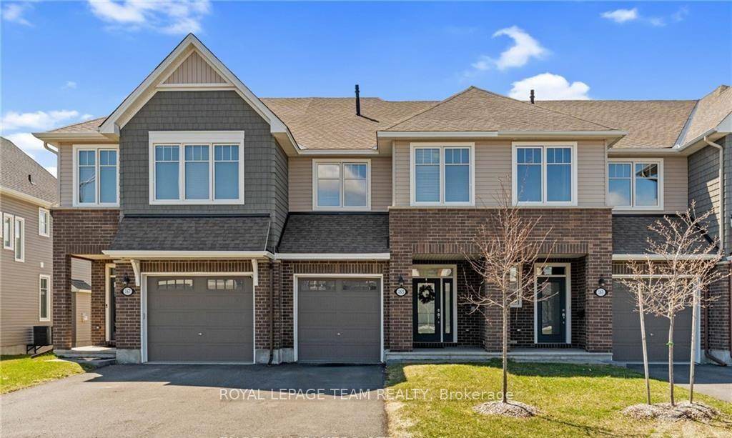 Welcome to executive family living in this stunning 2021 built TAMARACK Brock Model townhome nestled in Findlay Creek, complete with remaining Tarion Warranty !