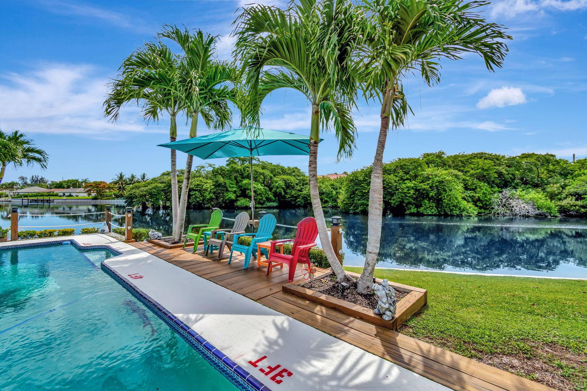 This Turn Key Lakefront home connects to Lake Ida, Lake Eden and Lake Osbourne.