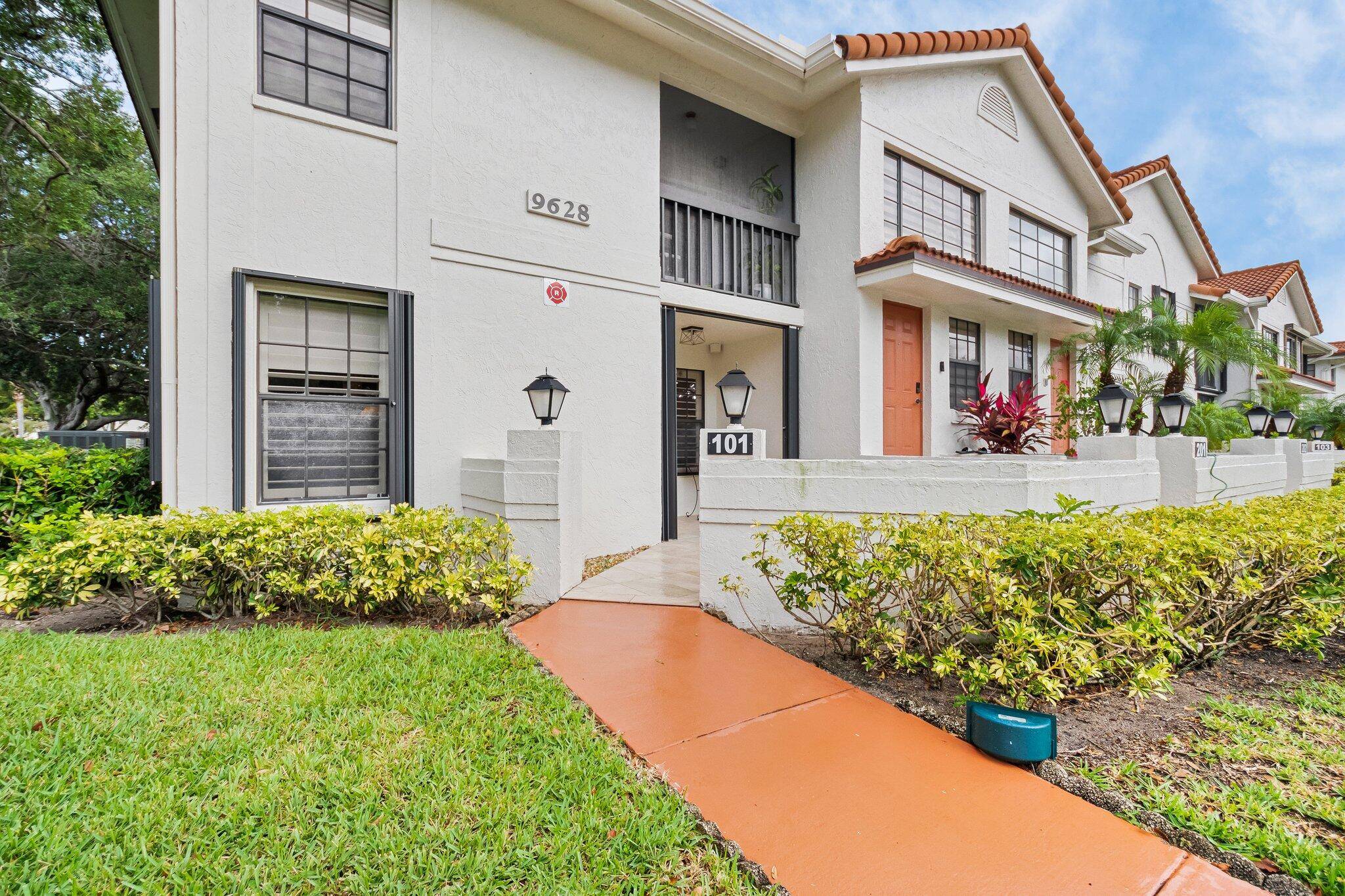 Beautifully renovated 1st fl corner 2BR 2B unit with water views in front rear in well maintained 55 community.