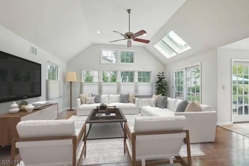 Stunning 3100 SF home located on beautifully landscaped property, walk to town and top rated schools.