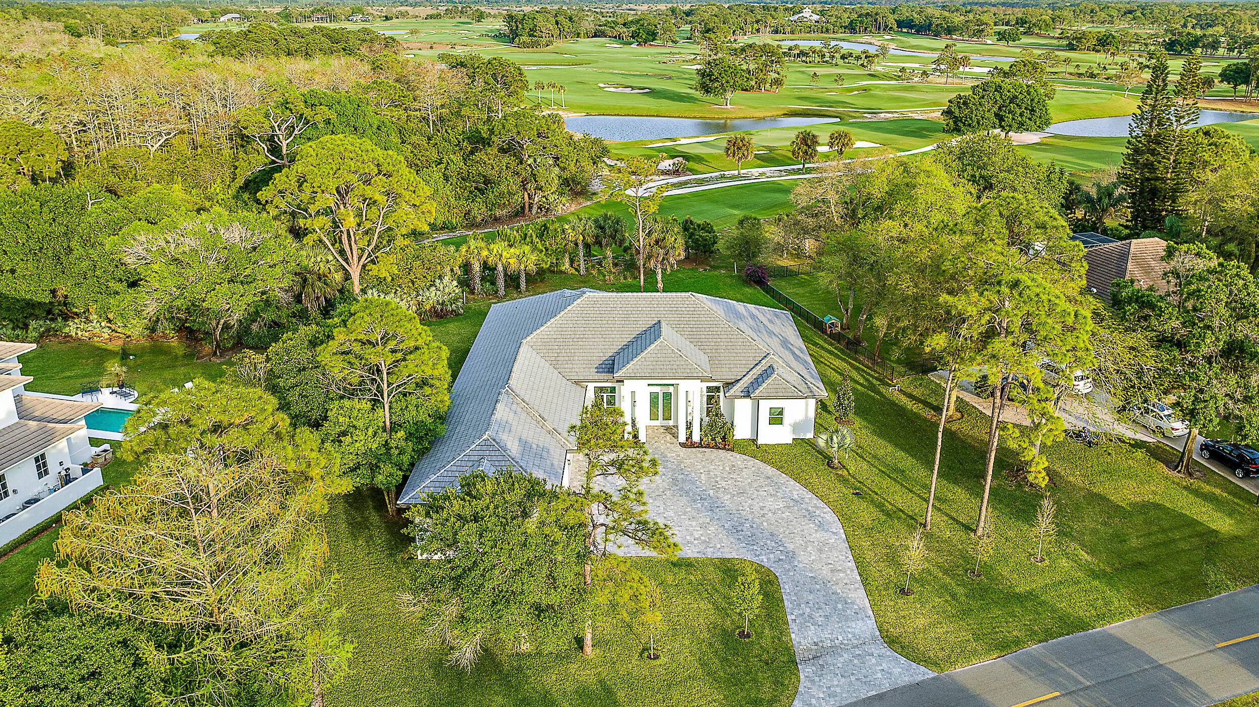 This newly built, one story CBS home offers an exceptional living experience right on the Old Trail golf course.