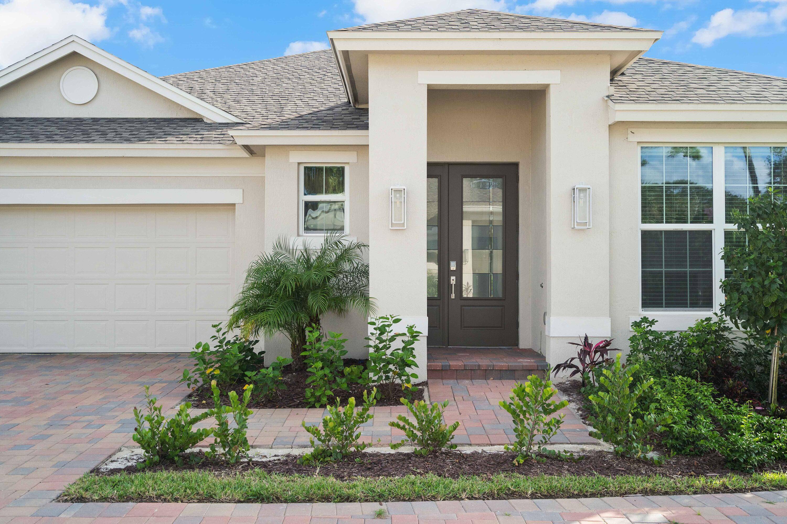 Brand New Concrete Steel Reinforced Block Home with 3 bedrooms, 2 baths, 2 car garage Lake Front View.