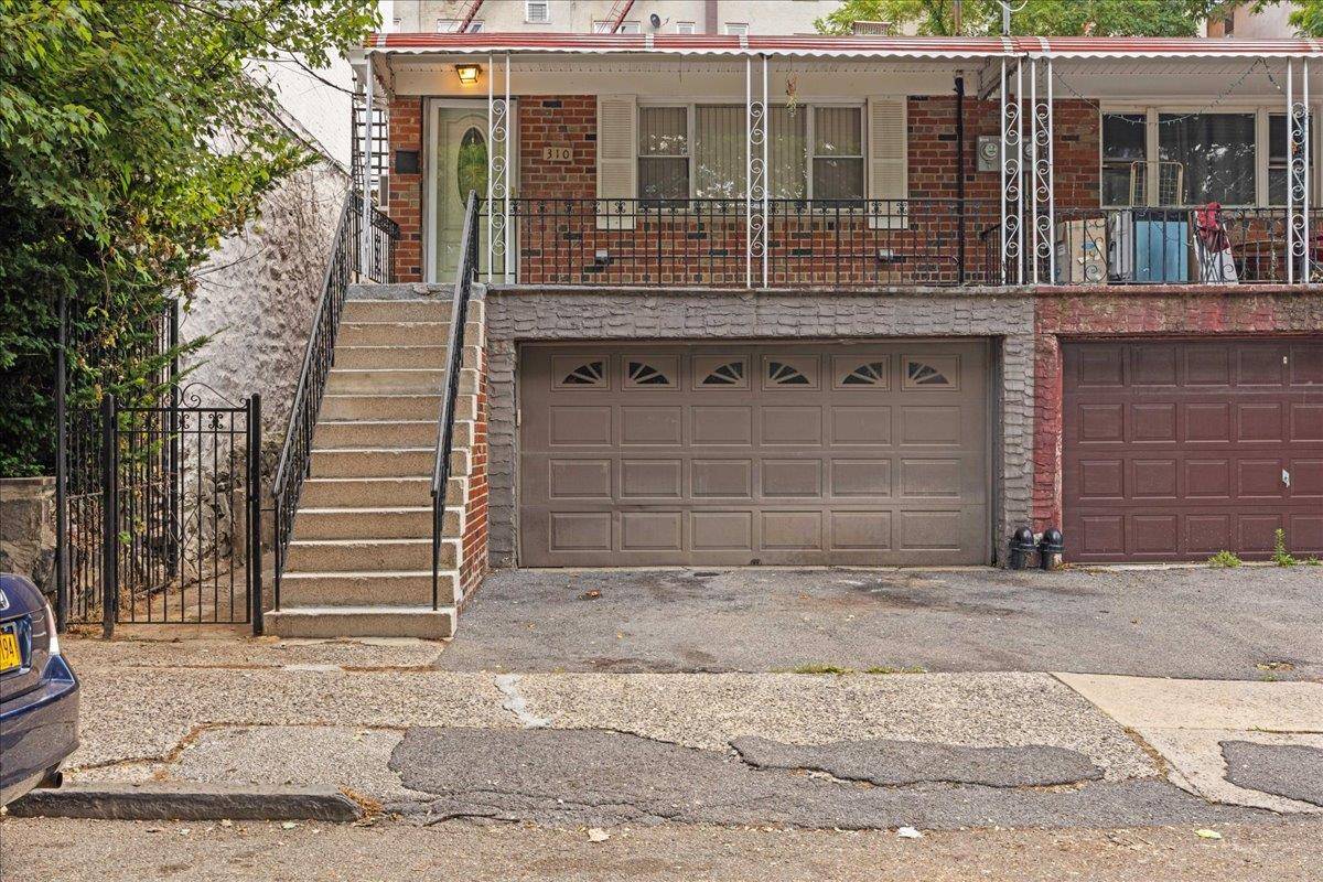 Discover the potential of this multifamily home at 310 Woodworth Avenue, just 30 minutes from Manhattan.