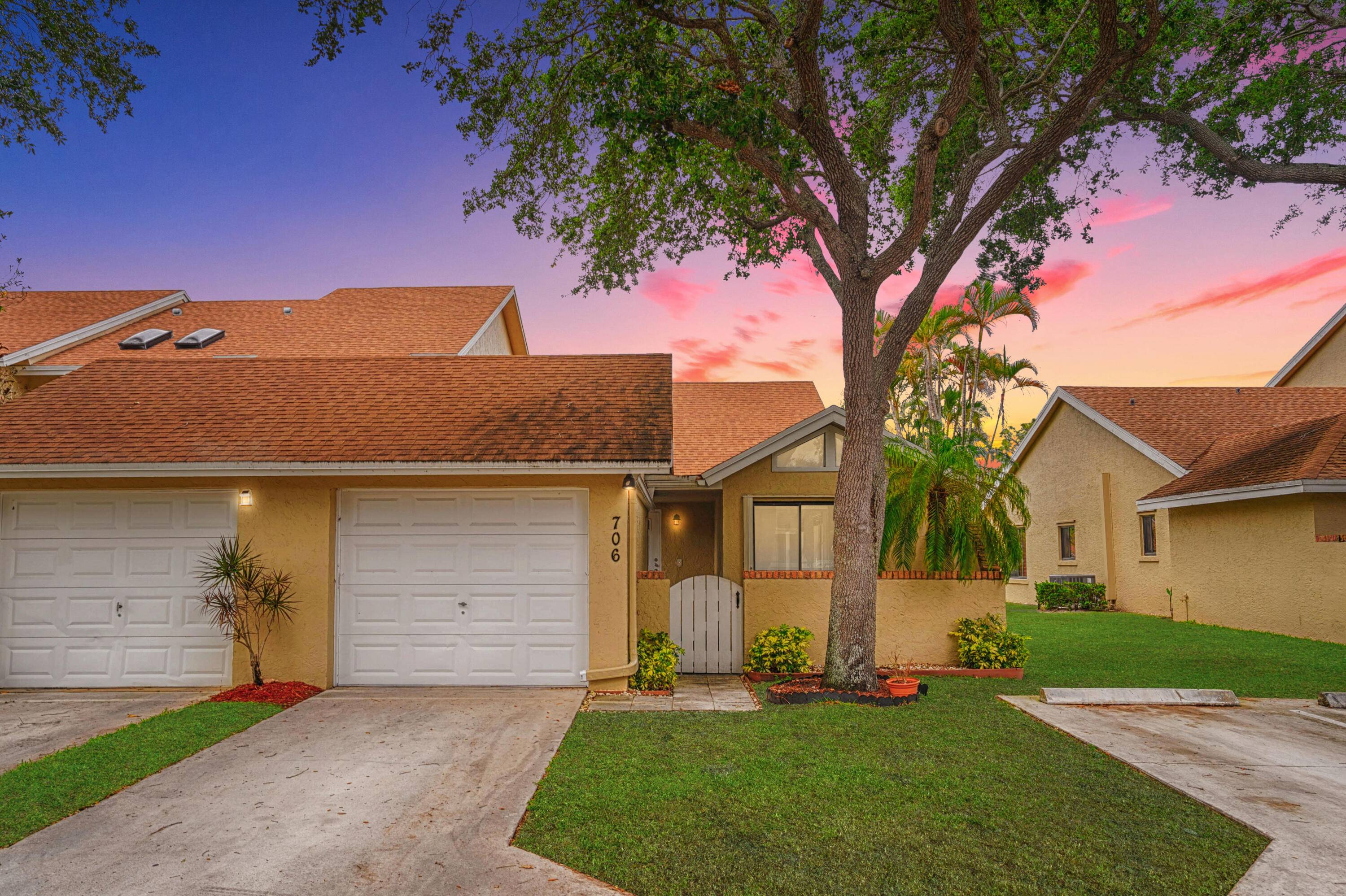 Single story townhouse in Greenacres, offers a blend of contemporary design practical living.
