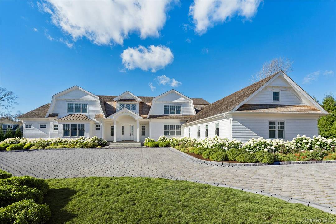 Nestled in the picturesque community of Westhampton Beach, this stunning seven bedroom home combines luxurious living with the charm of coastal life.
