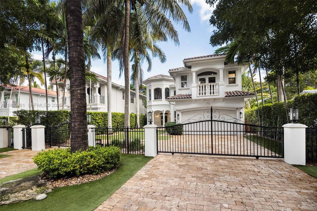 A gated Mediterranean inspired retreat in South Coconut Grove, this two story residence blends elegant design with seamless indoor outdoor living.