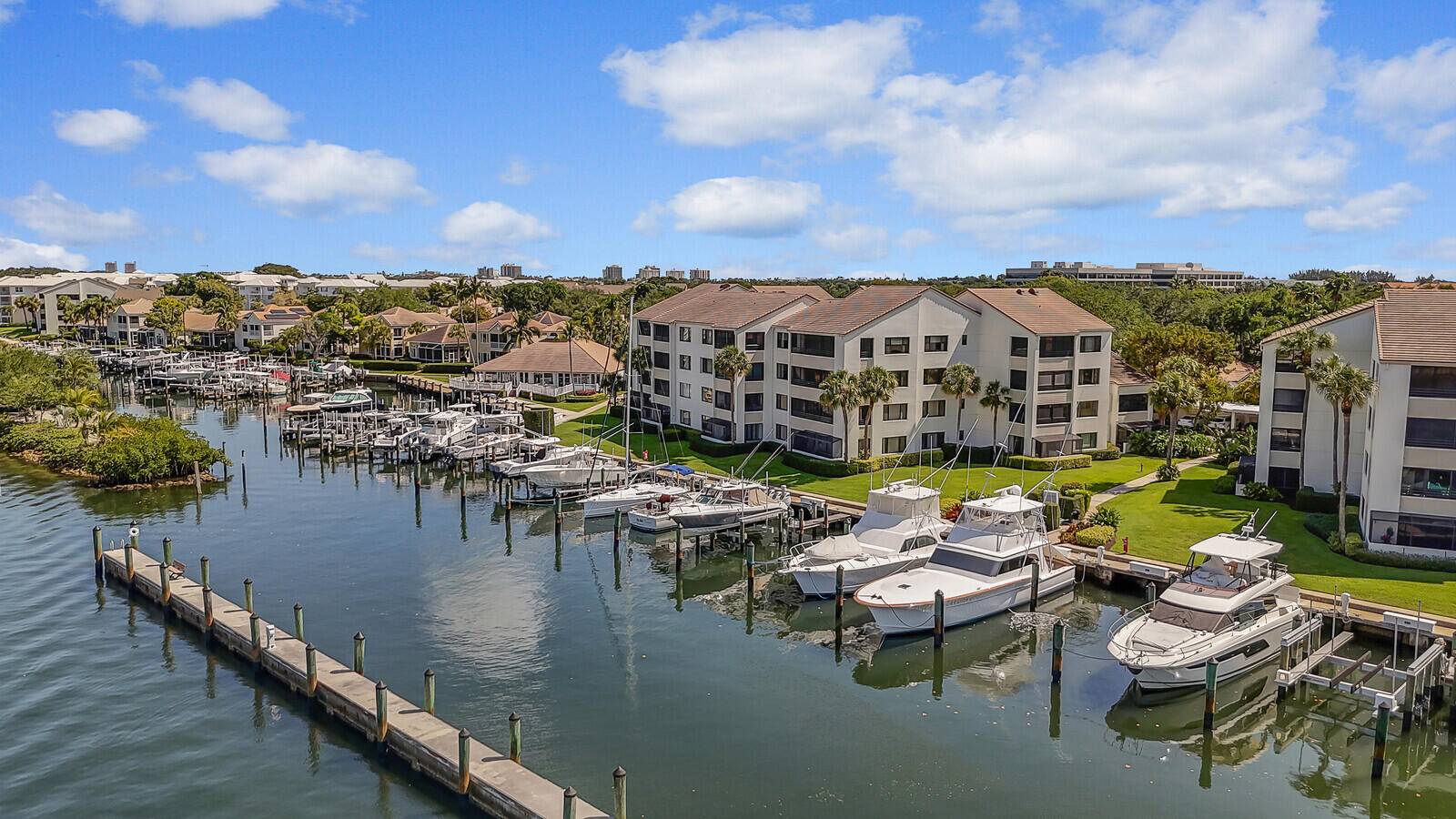 Welcome to your serene coastal retreat nestled in the heart of Juno Beach, within the sought after gated, intracoastal community of Oak Harbour.