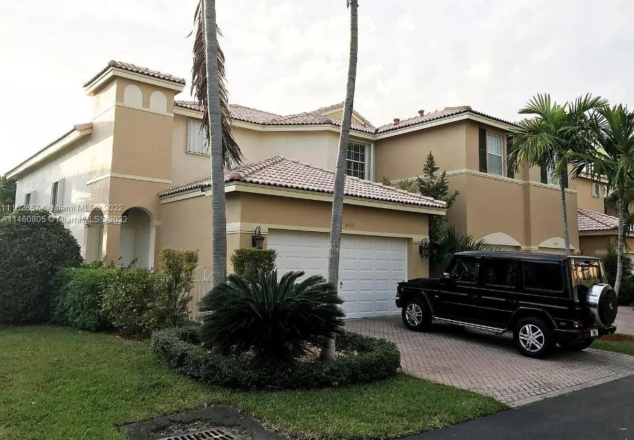 Fully renovated corner home in gated community.