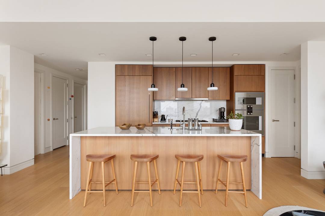 This 1, 373 square foot two bedroom, two and a half bath home delivers open south and east views of the downtown skyline, 10 foot ceilings, wide plank oak floors, ...