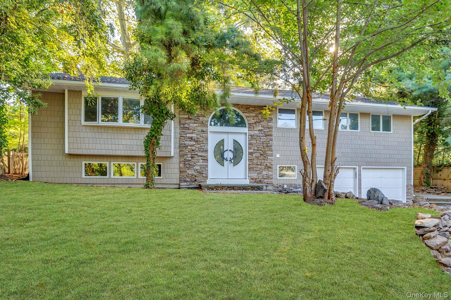 FULLY RENOVATED 2025 ! ! WALK INTO A GORGEOUS CATHEDRAL CEILING FOYER WITH GLASS RAILINGS AND MODERN OPEN LAYOUT !