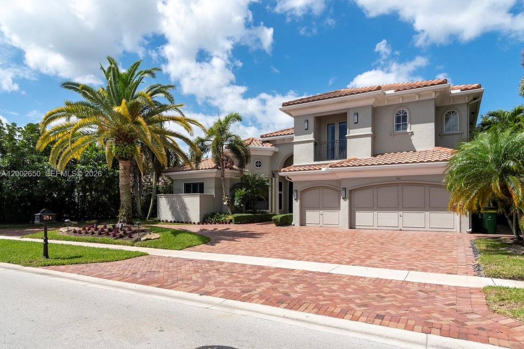 Set in the prestigious, gated Hawks Landing community in Plantation, this 2011 two story residence offers 5 bedrooms and 6.