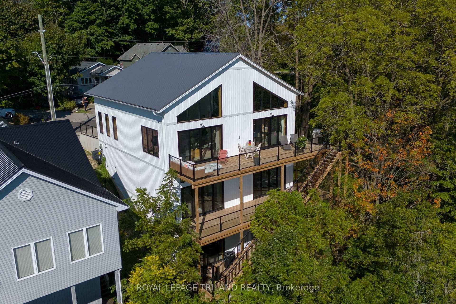 This Scandinavian inspired and styled, completely custom built 3 storey ICF home will take your breath away.