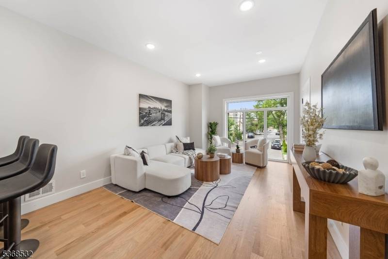 Welcome to this gorgeous brand new construction 2 family home, where modern design meets everyday practicality.