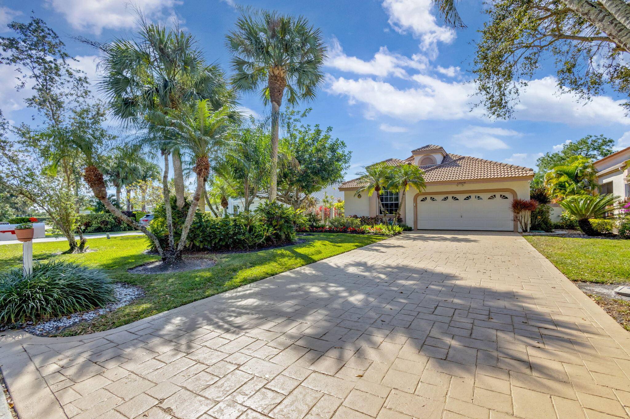 This beautifully designed lush landscaped Pool home serves light and bright with 2 bedrooms, 2 baths and a den that can be easily converted to 3rd bedroom, baths remodeled.
