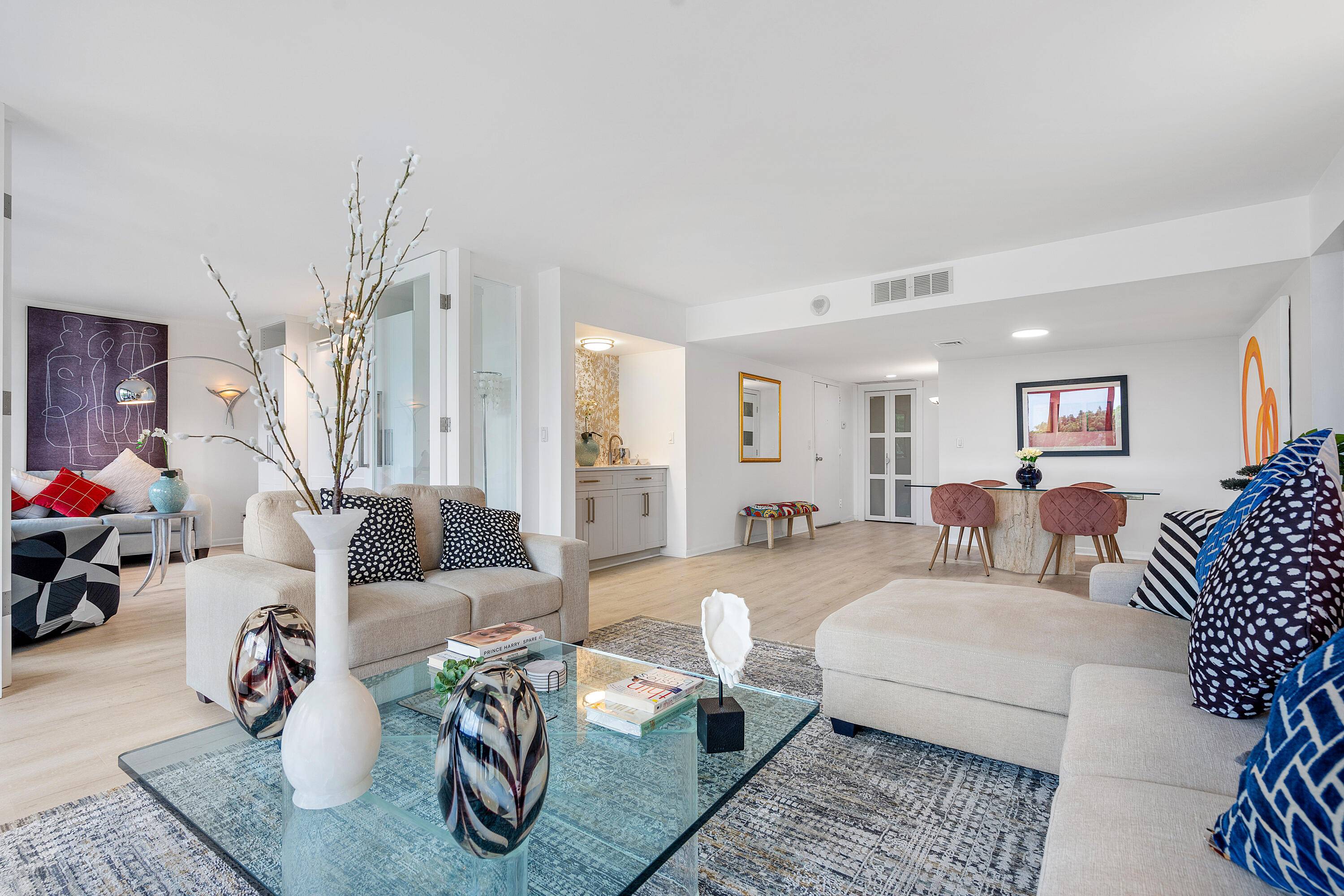 Welcome to your pied a terre in the heart of West Palm Beach, where the convenience of condo living meets the spaciousness of a private house.