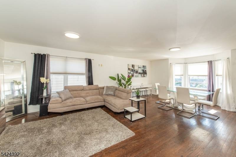 A RARE FIND ! ! ! Welcome to the 2 family home that you've been waiting for in the vibrant city of Elizabeth !