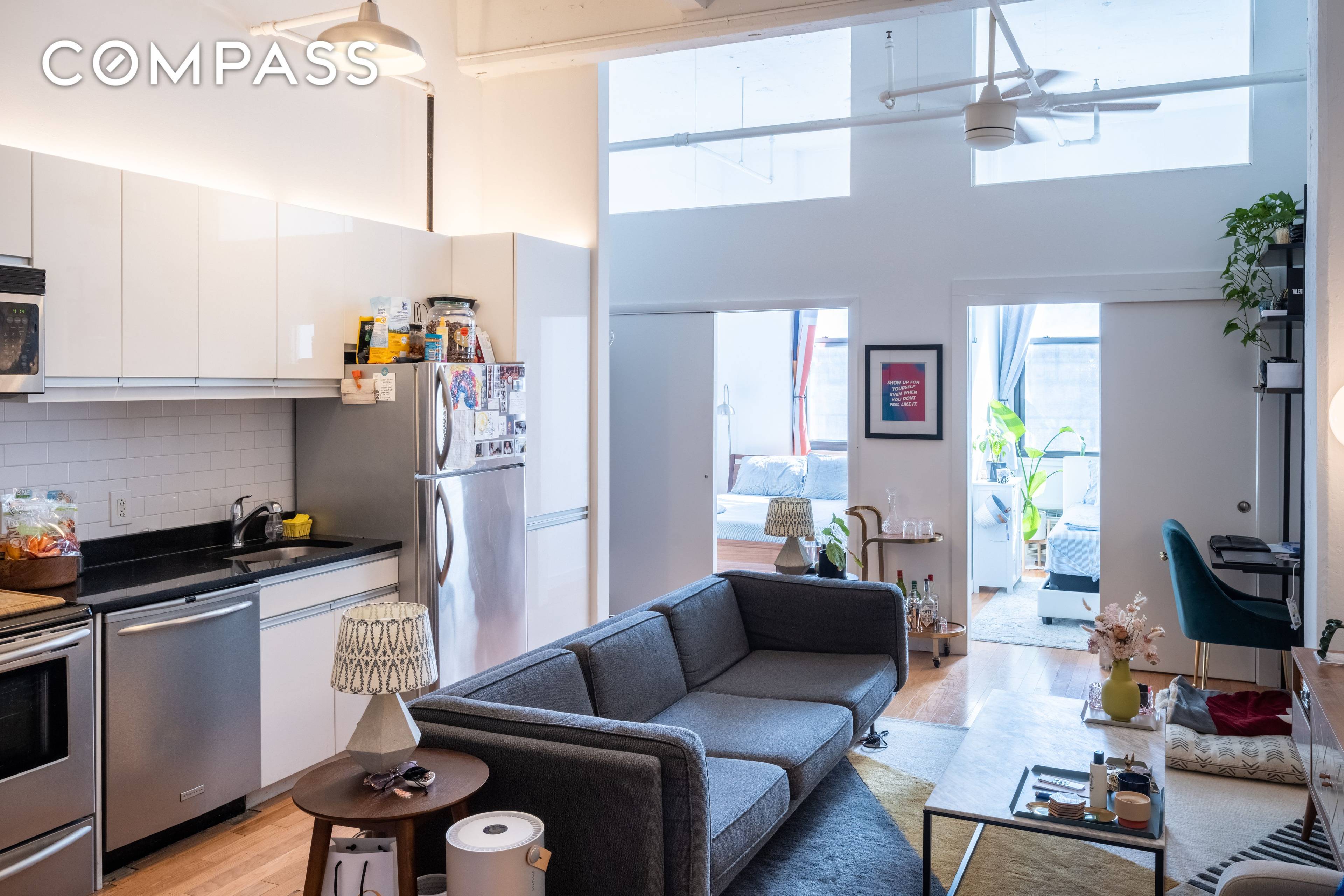 2Bed 1Bath apartment with 14 ceilings, large windows that provide natural light in this airy unit.