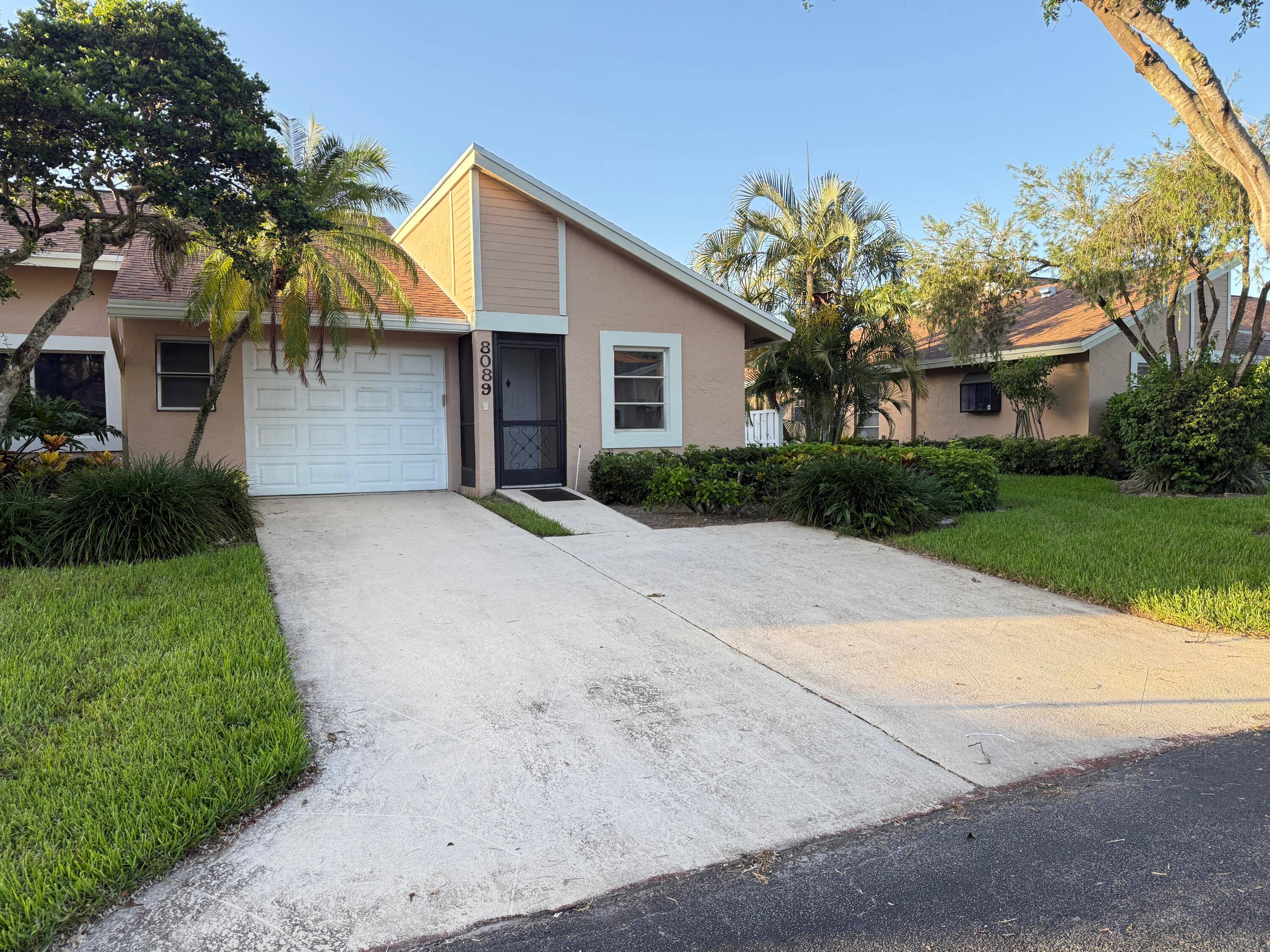 Step into this beautifully updated villa with a brand new roof, nestled in the serene Whisper Walk community of Boca Raton.