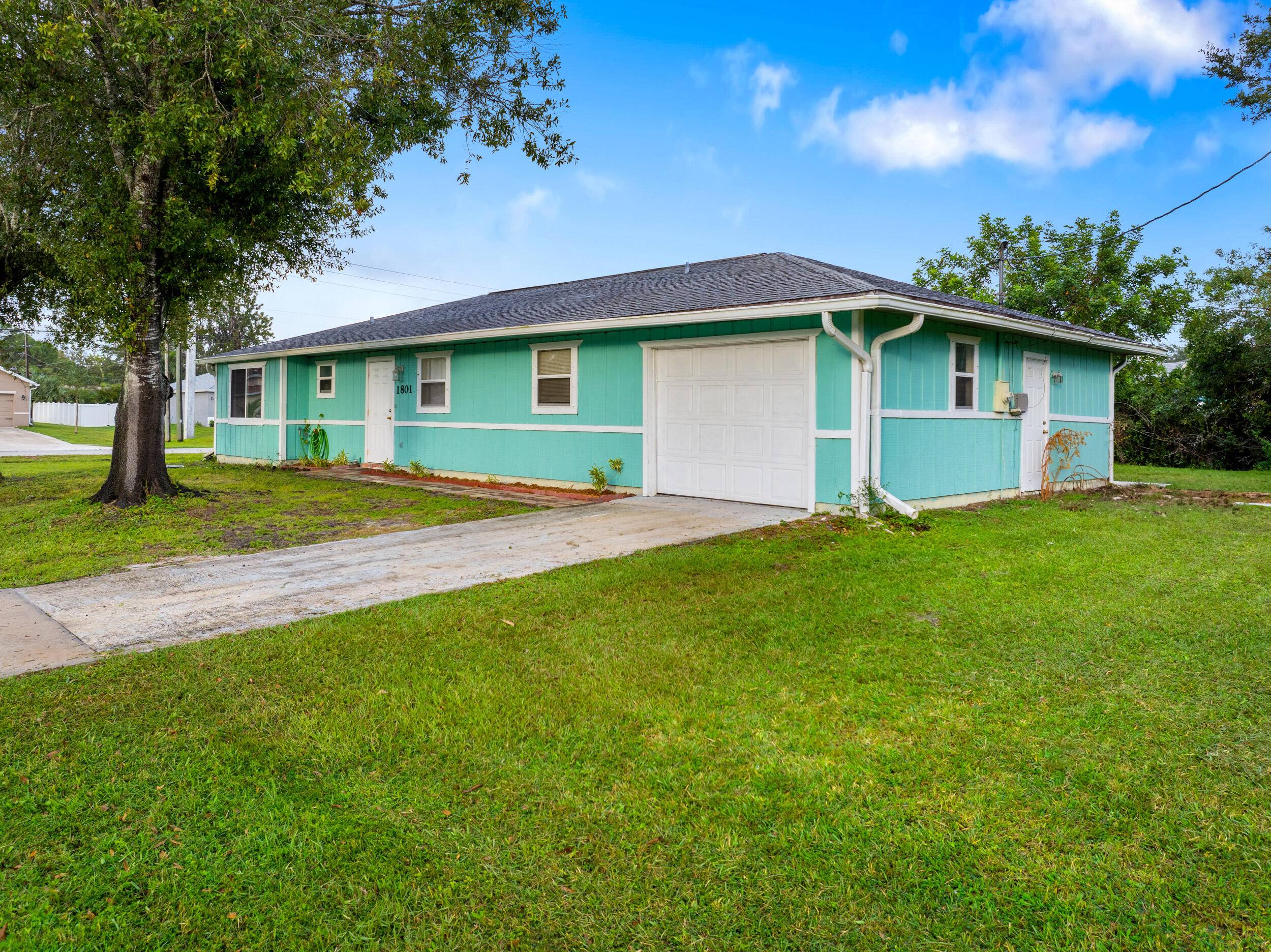 Corner lot opportunity with timeless charm and room to grow.