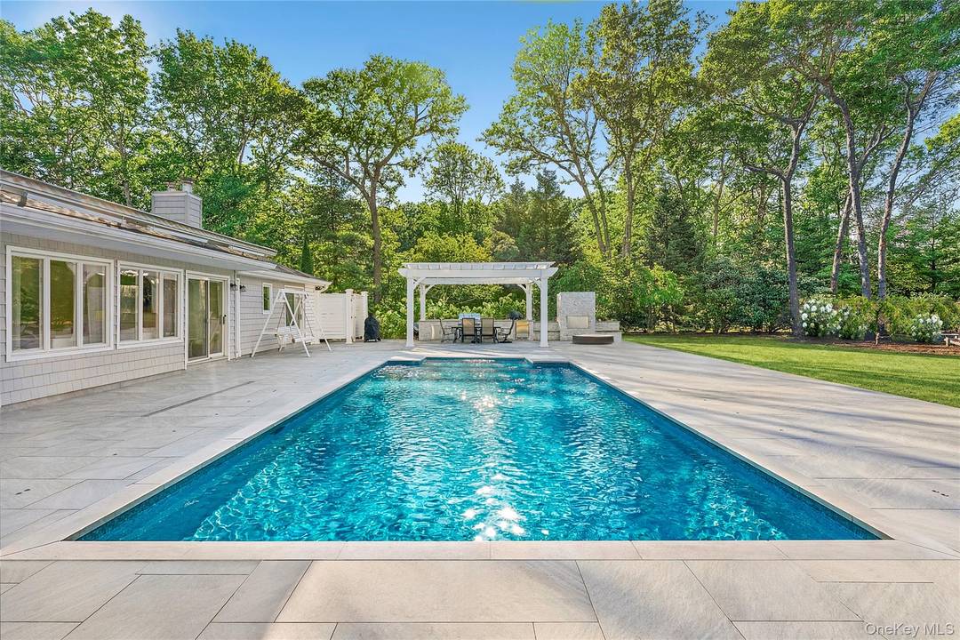 Set in the bucolic hamlet of Remsenburg, this 4 bedroom, 3 bathroom turn key home offers a number of amenities in the heart of the Hamptons.