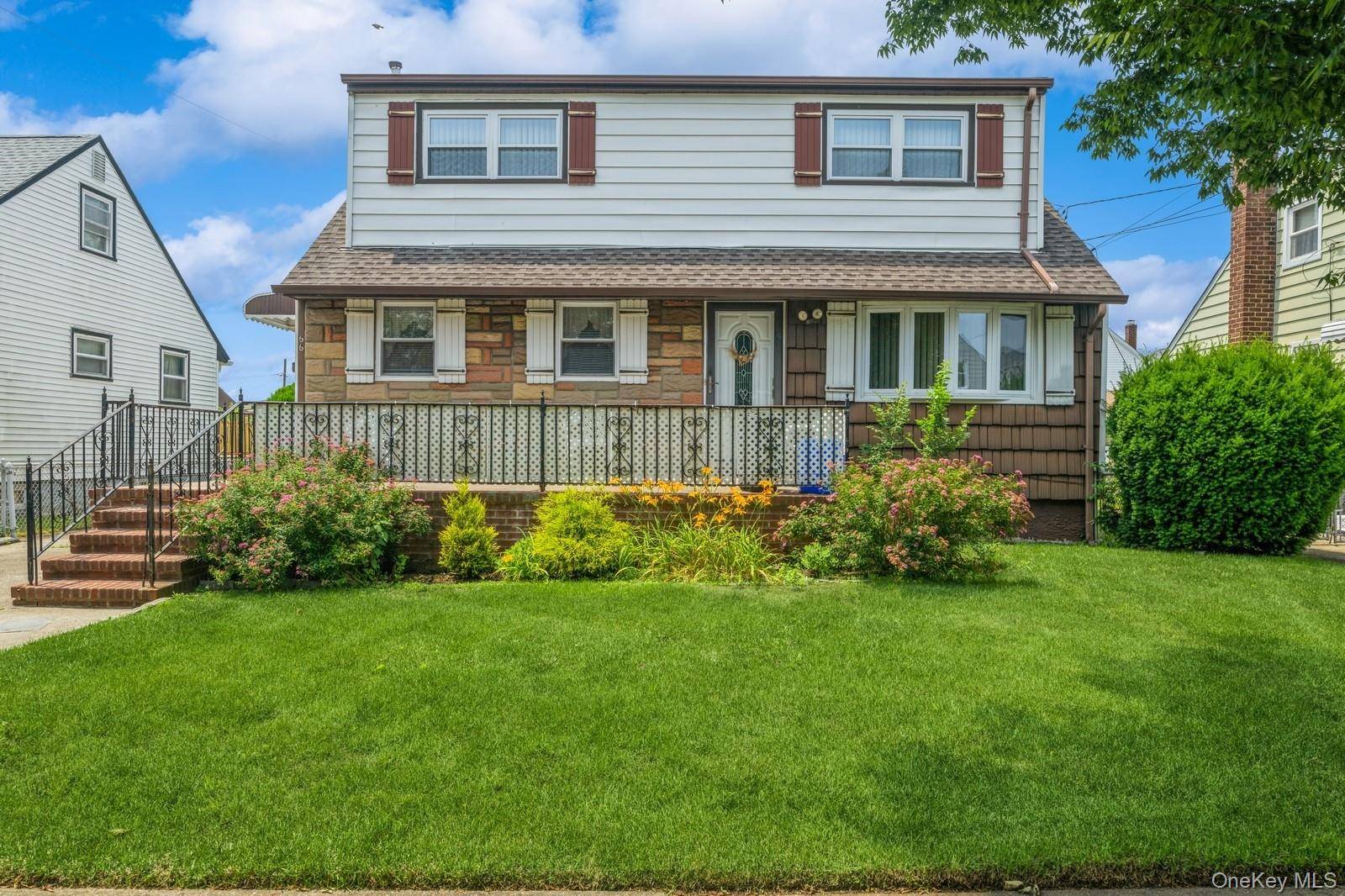 Cozy 2 Family Set Mid Block in Quiet Residential Neighborhood in the Village of Valley Stream.