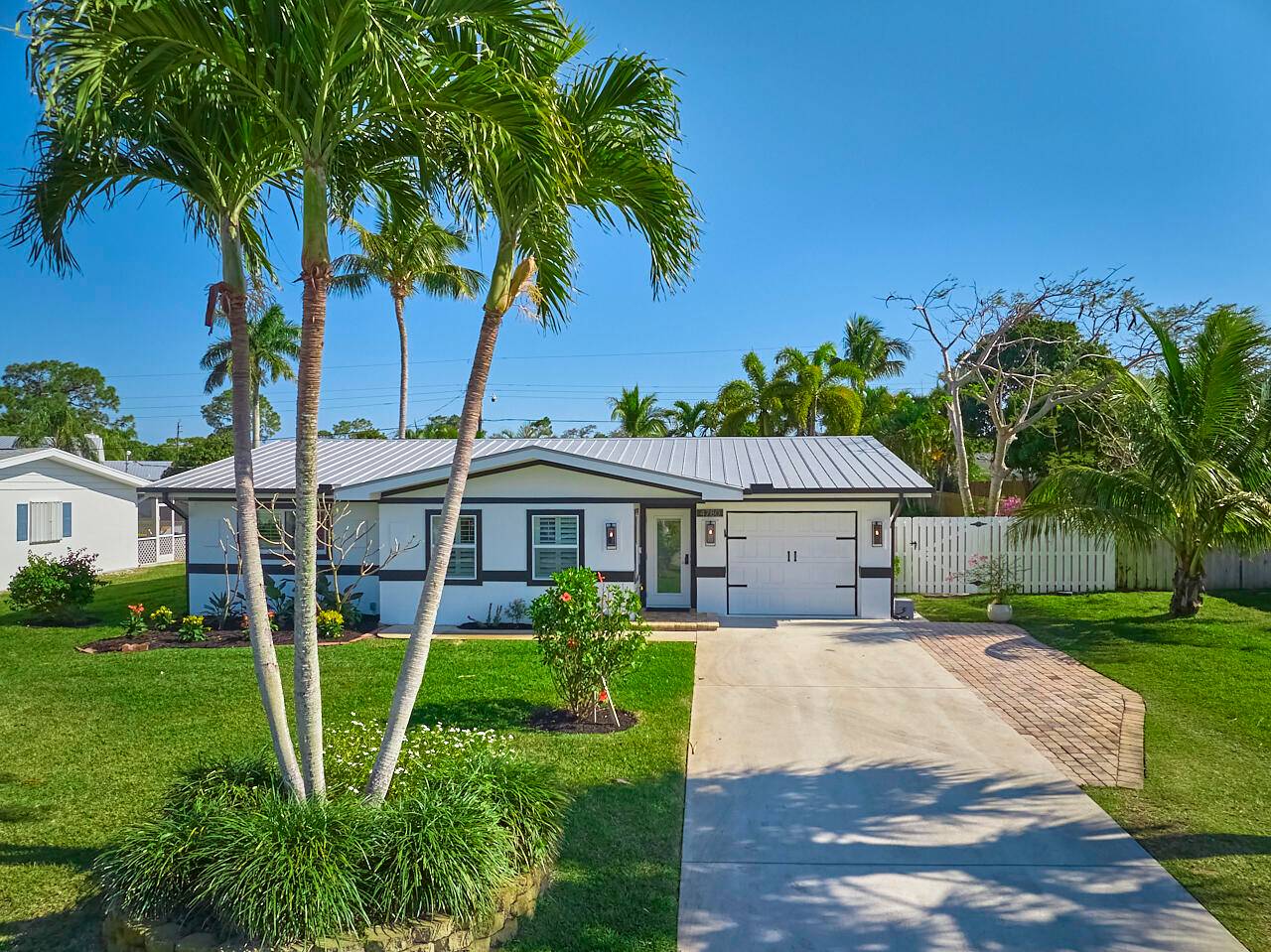 This charming home features an updated main house with 2 bedrooms 2 bathrooms, complemented by a versatile guest house in the back that includes a half bath and an outdoor ...
