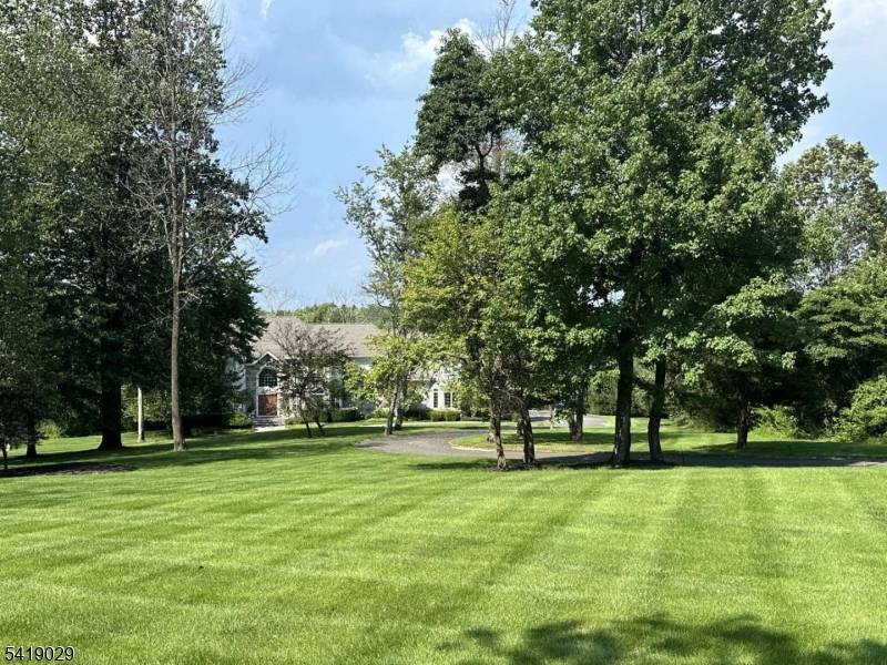 6 BR, 5. 2 Bath SF home in 2 acres, on a quiet street in Basking Ridge, one of the Top school districts in NJ.