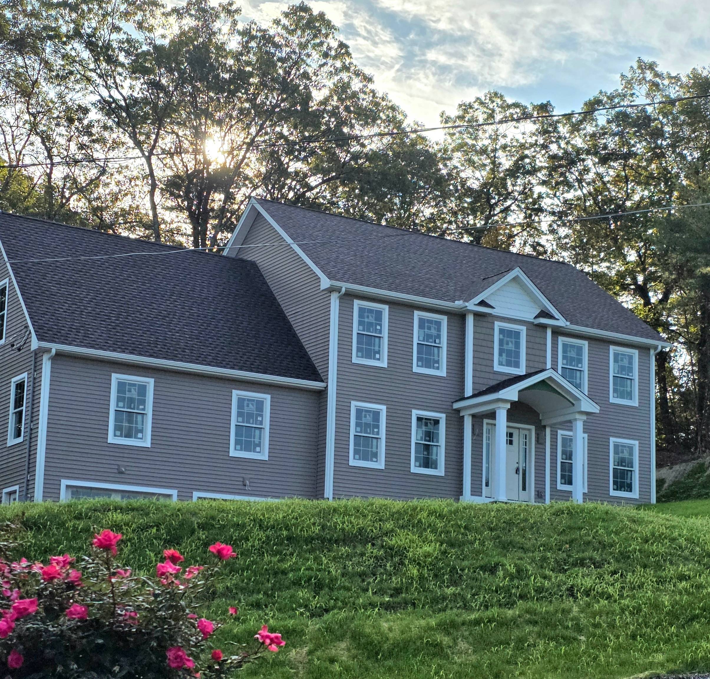 Beautifully set Colonial above Crystal Lake.