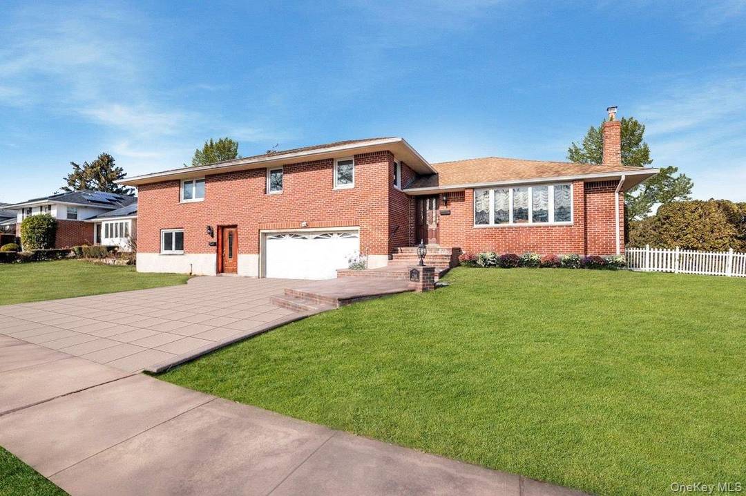 Located in the Salisbury Estates section of Westbury, this expansive and thoughtfully designed residence offers a substantial layout across multiple levels, featuring six bedrooms and four full bathrooms.