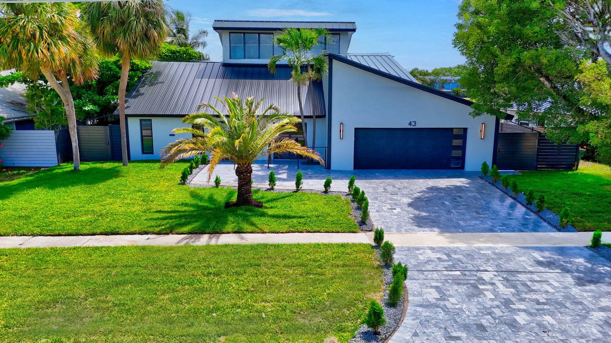 Modern Waterfront Luxury Fully Renovated Lake Ida AccessWelcome to your dream home !