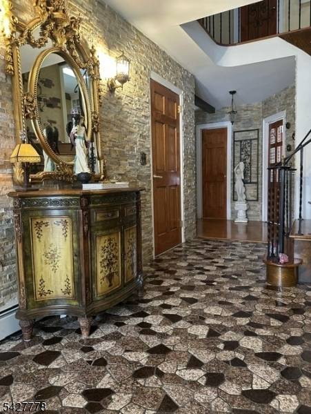 Welcome to this beautiful, custom and well maintained split level single family home in desirable Hanover.