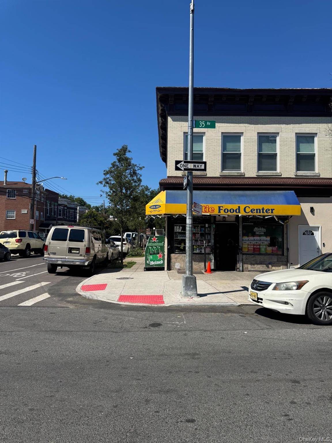 Corner Property featuring a rented storefront bodega no lease on the first floor and a fully renovated, vacant 3 bedroom apartment on the second floor.
