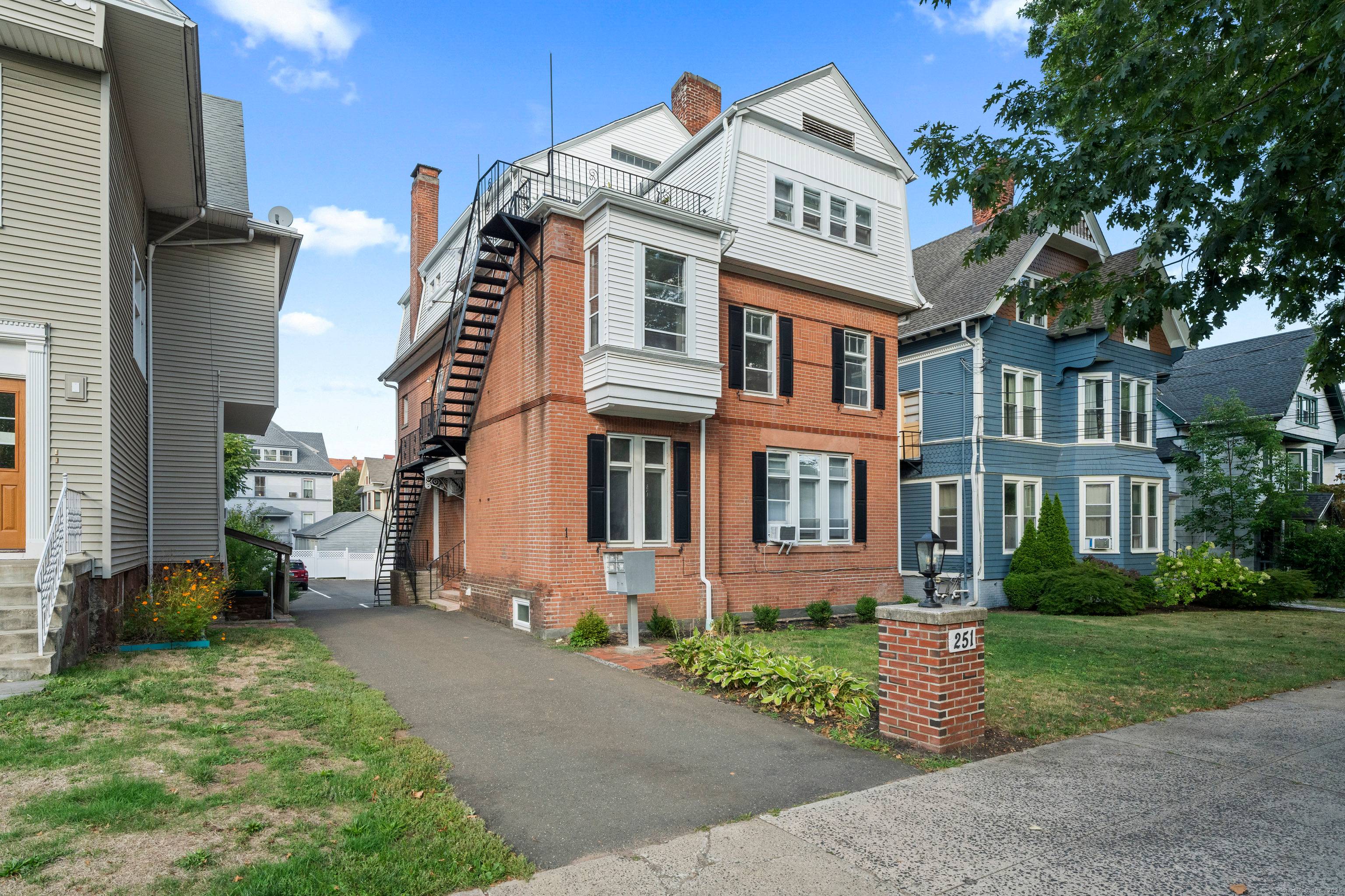 Legal 4 family located in the heart of the East Rock on Lawrence St between Whitney Livingston perfect for an owner occupied buyer or investor !