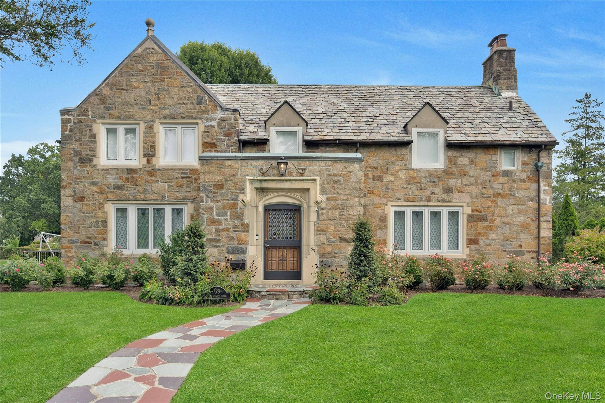 Stunningly renovated Stone Colonial in prestigious Fox Meadow neighborhood offers a rare blend of timeless character and modern sophistication.