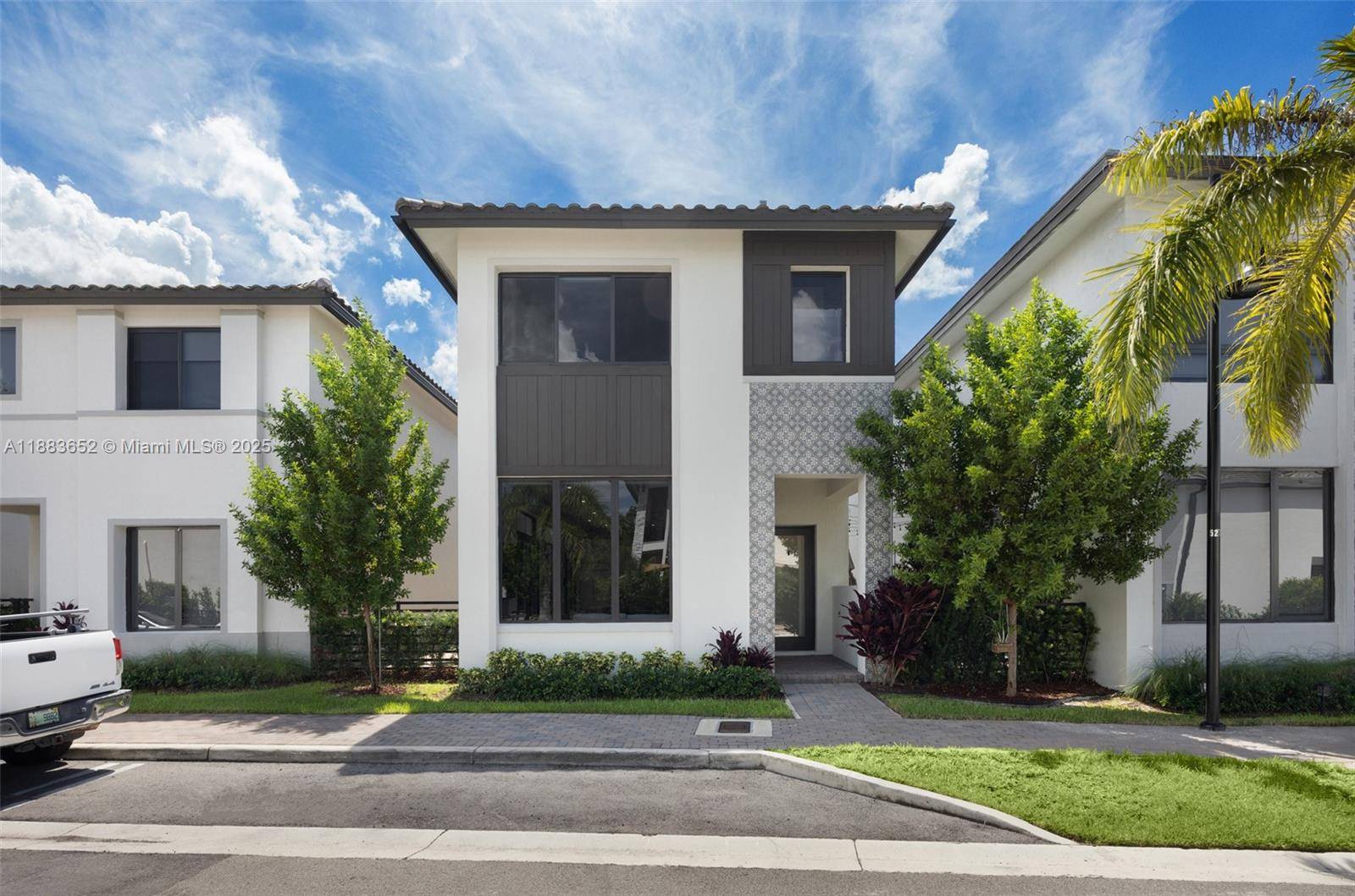 Move in ready and fully upgraded, this 2023 two story home in Canarias offers refined living in the heart of Downtown Doral.