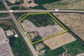 Approximately 30 acres of development land with direct access to the Hwy 401 interchange and excellent Highway 401 exposure.