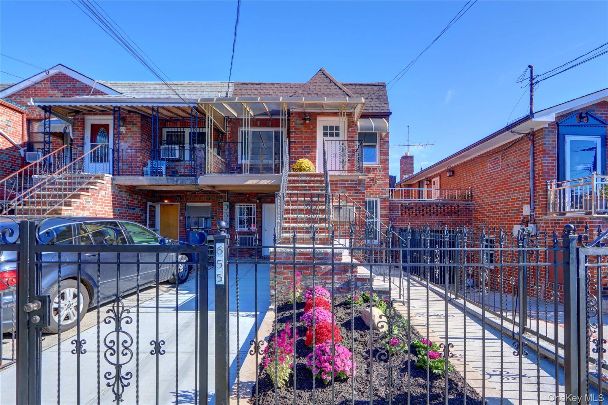 Absolutely stunning and spectacular two family masterpiece with beautiful kitchens, bathrooms, new roof, gorgeous flooring, off street parking, and a fantastic walk out basement that leads to a wonderfully fenced ...