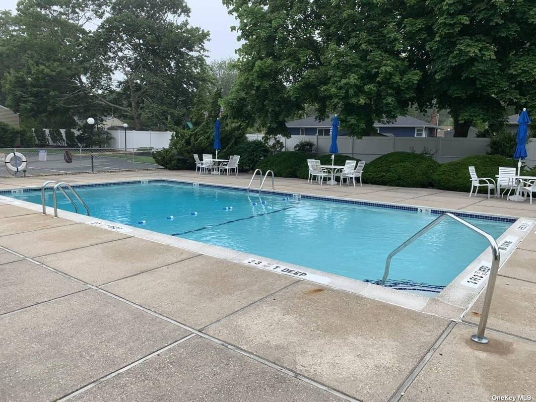 Experience refined coastal comfort in this elegant one bedroom condominium in Hampton Bays, NY.