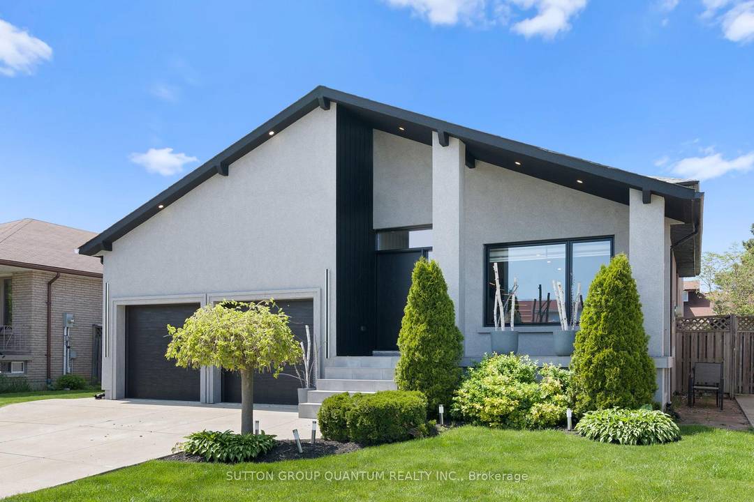 Nestled on a quiet, family friendly street beneath the Escarpment, this exceptional custom renovated home impresses at every turn.