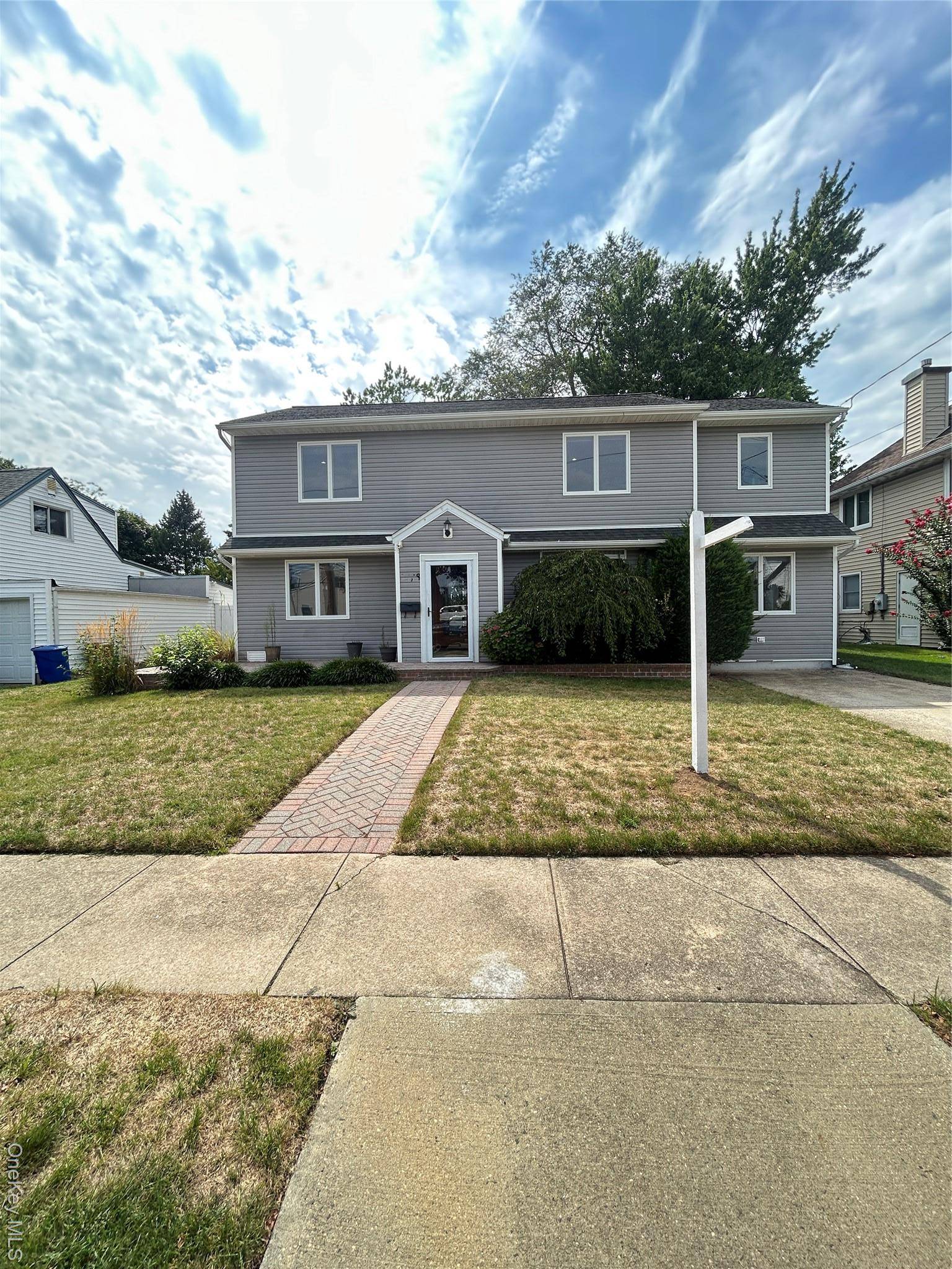 A spacious Colonial Style house with a total living area of 2, 342 sq ft offers a charming and functional layout.