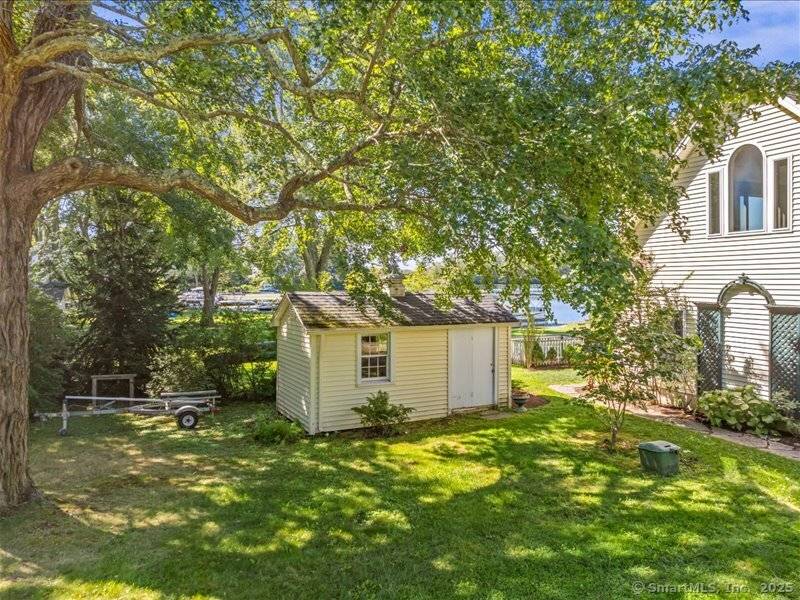 Lakefront living meets New England charm in this beautifully remodeled 3 bedroom, 2 bathroom home on desirable Rogers Lake in historic Old Lyme, CT.