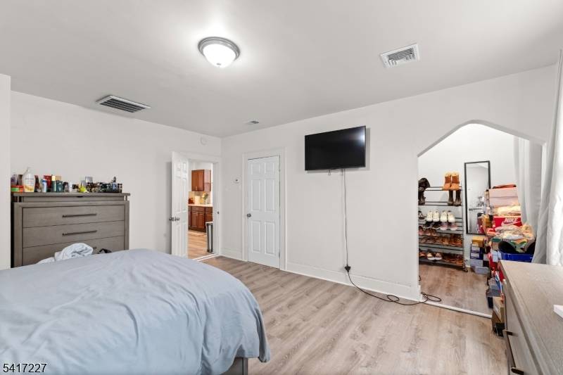 Welcome to 92 S Devine St, an exceptional two unit property in Newark's Lower Vailsburg neighborhood boasting direct views of Vailsburg Park right across the street.