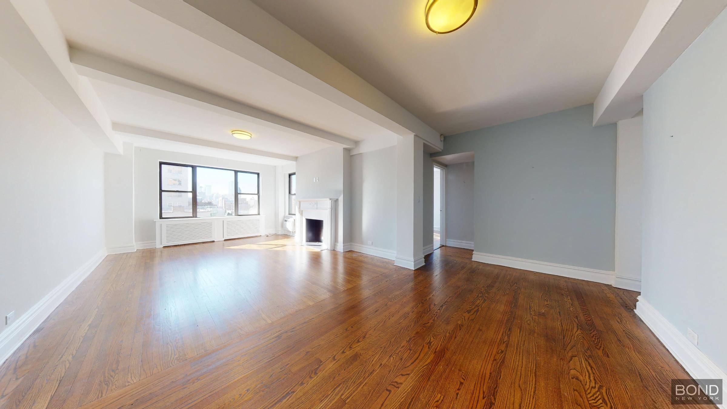 Massive 1 bedroom with a deco fireplace in a well maintained doorman building.