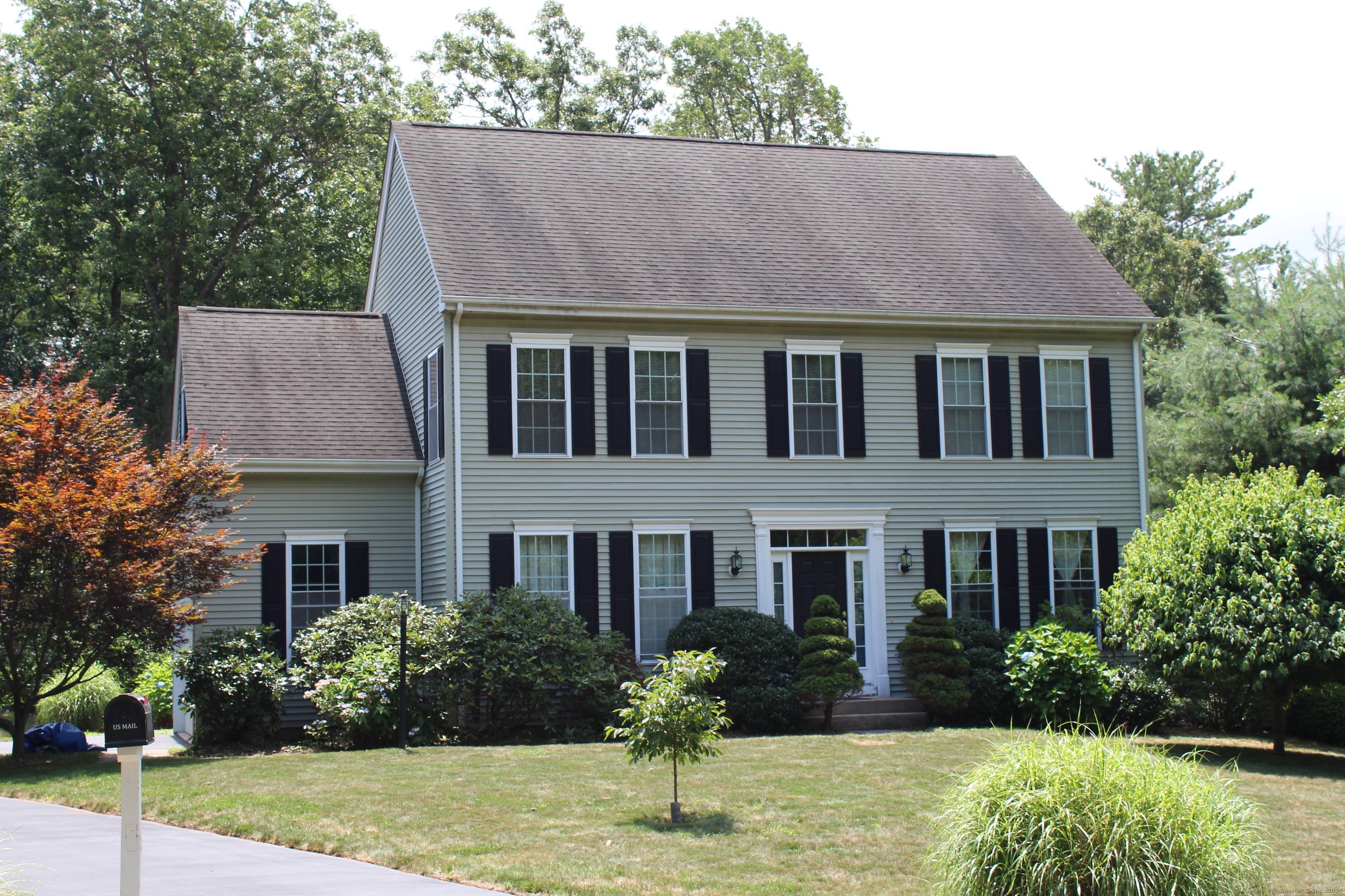 Pristine and private. This beautiful home features hardwood floors throughout the 1st floor and 2nd floor hallway, along with soaring 9 ft ceilings.