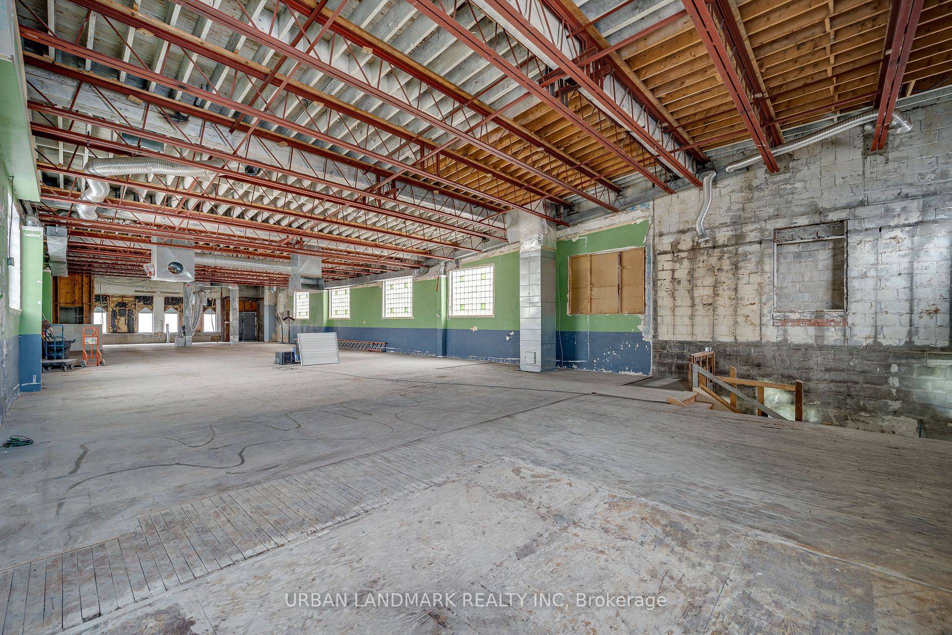 Junction Stockyards area entire free standing building for lease, 14 16' ceiling on main floor, 8' ceiling in lower level, rear lane loading, signage opportunity.