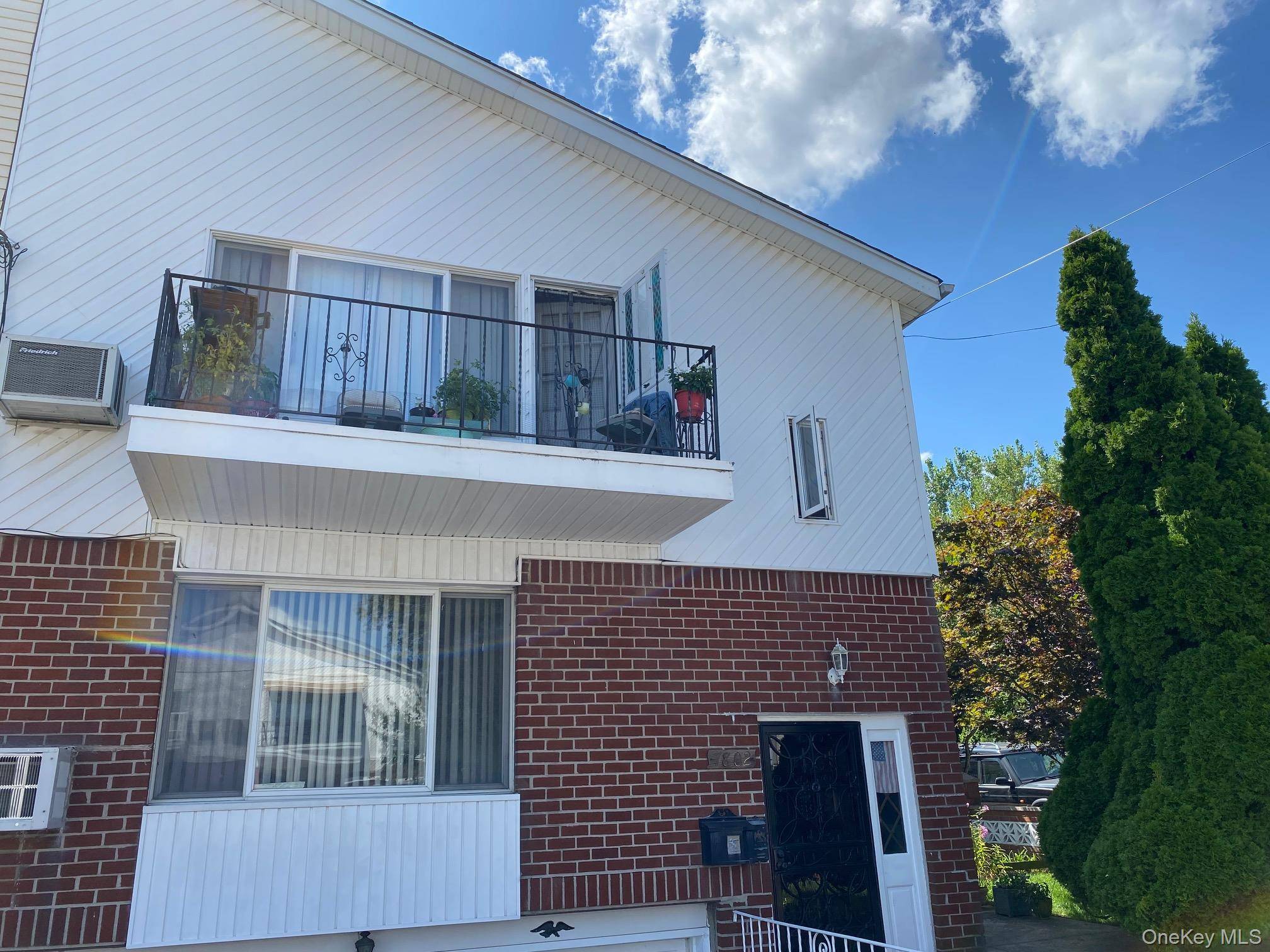 Howard Beach. Semi detached large 2 family Hi Ranch located in Lindenwood village.