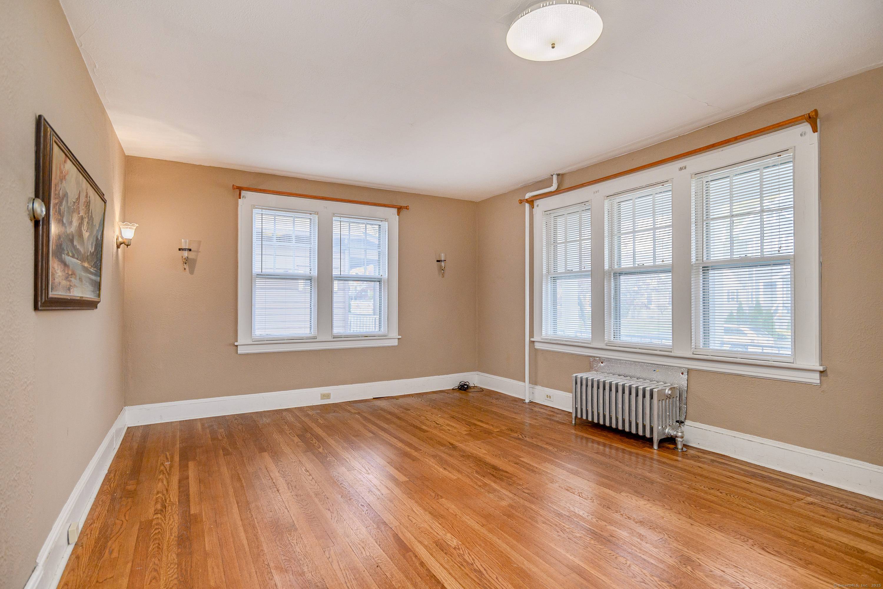 Bring your vision to this two family home offering flexibility, space, and a great location near Western Connecticut State University, Danbury Hospital, shopping, and commuter routes.