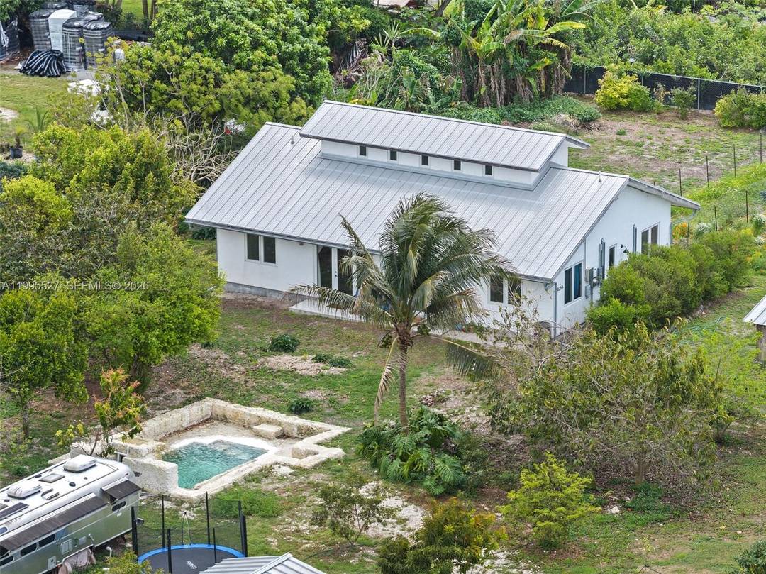 Tucked away on 1. 54 lush acres in the Redlands, this thoughtfully designed eco friendly, owner built estate blends sustainability with serene living.