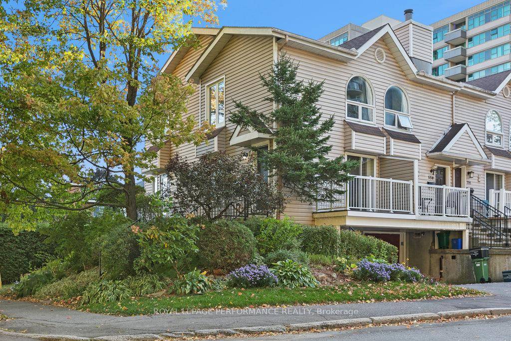 Rare Find End Unit Freehold Townhome Fronting on NCC Land !